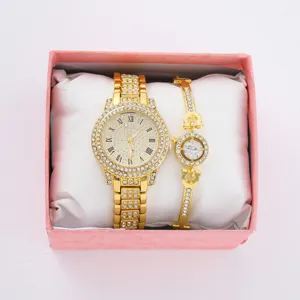 Set orologio al quarzo e bracciale in strass oro da donna con eleganti numeri romani.