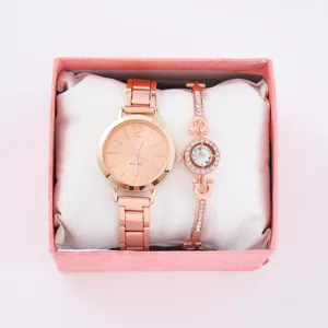 Orologio al quarzo oro rosa e set bracciale con strass da donna confezione regalo.