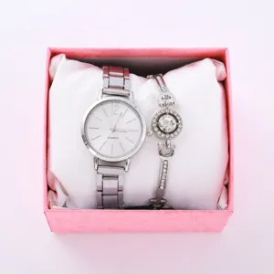 Set regalo orologio da polso donna al quarzo e bracciale con strass in scatola rosa.