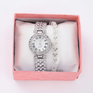 Set elegante di orologio al quarzo con strass da donna e bracciale coordinato in confezione.