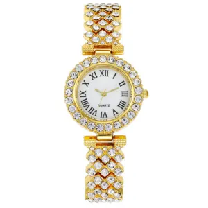 Elegante orologio da polso al quarzo da donna dorato con strass brillanti e numeri romani classici.