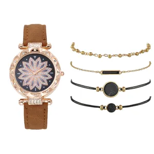 Set orologio donna moda con elegante quadrante floreale in strass e quattro bracciali abbinati.