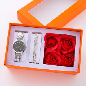 Set regalo orologio quarzo donna con bracciale e rose artificiali in scatola arancione.