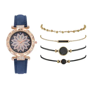 Vista dettagliata orologio donna al quarzo e set bracciali con quadrante floreale pietre.
