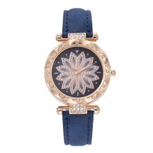 Orologio da donna con strass floreali, cinturino in camoscio blu e lunetta in oro rosa