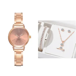 Orologio al quarzo in oro rosa e set di gioielli in cristallo dal design minimalista elegante.