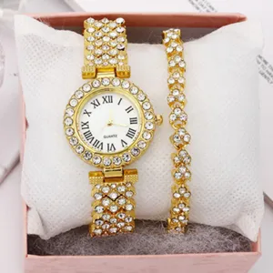 Set orologio al quarzo e bracciale con strass da donna, design dorato di lusso con numeri romani.