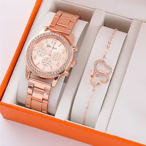 Set regalo orologio al quarzo oro rosa e bracciale cuore con lunetta in cristallo e quadrante.