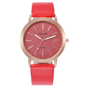 Orologio al quarzo da donna con cinturino rosso cassa oro rosa e quadrante luminoso.