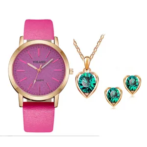 Set orologio quarzo donna con cinturino rosa e collana orecchini cristallo cuore verde.