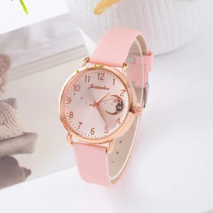 Orologio al quarzo da donna rosa con cassa in oro rosa, cinturino in pelle e quadrante elegante.