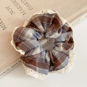 Vintage brown plaid hair scrunchie with white lace trim, elegant aesthetic hair accessory.