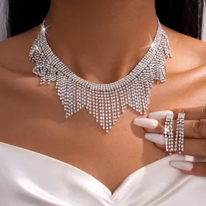 Detailed close-up of European court style luxury sparkling zircon collar necklace and earrings.