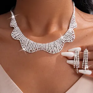 Stunning rhinestone collar necklace and fringe earrings set, sparkling court style jewelry.