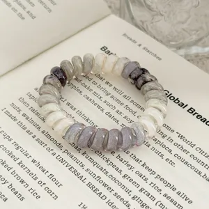 Chouchou spirale telephone elastique avec texture effet encre degradee pour femme.