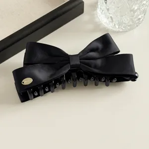 Zwarte satijnen strik haarklem voor vrouwen, elegante bananenclip paardenstaart houder stijl.