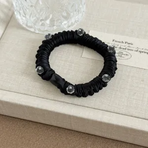 Black satin crystal hair scrunchie korean style elegant hair tie detail view