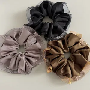 Satin crystal mesh scrunchies set, elegant hair ties for women ponytail styling details.