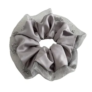 Elegant grey satin hair scrunchie with sheer organza mesh edge and sparkling crystal details.
