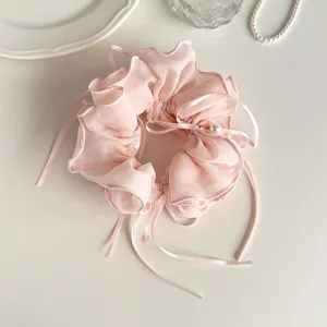 Detail view of pink chiffon ribbon pearl hair scrunchie, sweet Korean hair accessory