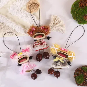 Handmade natural nut shell doll pendant detail, creative hanging ornament with cute hair.