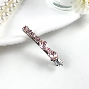 Exquisite pink crystal hair clip with sparkling rhinestones, elegant side hairpin for women.