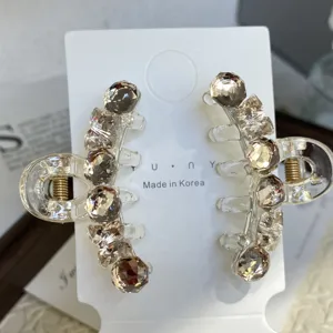 Small clear rhinestone hair claw clips set, sparkly crystal mini hair jaw clips for styling.