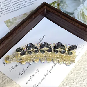 Elegant crystal banana clip hair accessory with black rhinestones for women daily wear styling.