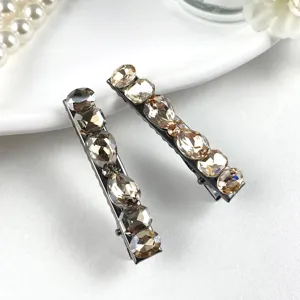 Exquisite crystal hair clips featuring sparkling multi-faceted rhinestones, elegant hairpin.