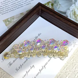 Crystal butterfly hair claw clip detail, elegant rhinestone banana clip for women daily styling.