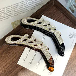 Rhinestone paperclip hair clip detail, elegant alloy banana clip for women and girls.