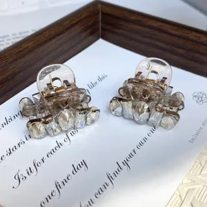 Mini rhinestone hair claw clips set, clear acrylic small hair jaws for daily styling.