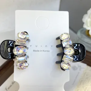 Sparkling crystal hair claw clips small size pair for bangs styling and side hair decoration.