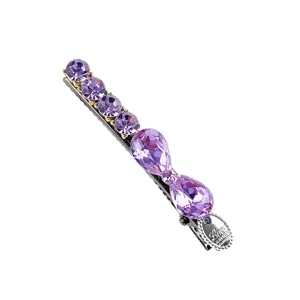 Elegant purple crystal hair clip, stunning rhinestone barrette for daily styling and party wear.