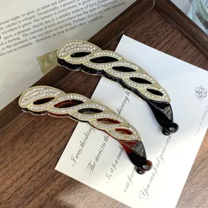 Rhinestone banana hair clip elegant alloy hair claw for women ponytail styling detail view