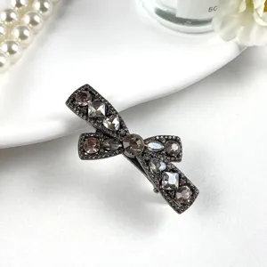 Crystal rhinestone bow hair clip sparkling metal side barrette elegant hair accessory for women.