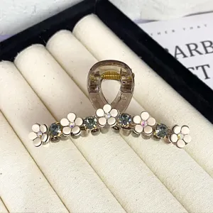 Camellia hair claw clip with rhinestones and white flowers, elegant small shark clip for women.