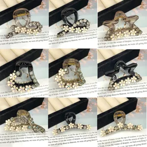 Rhinestone camellia hair claw clips, elegant small half-up shark clips for women's hair styling.
