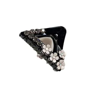 Elegant camellia hair claw clip with rhinestones, minimalist design for half-tied hairstyles.