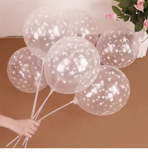 Ballons en latex transparent imprimé d'étoiles avec bâtons pour décoration de fête.