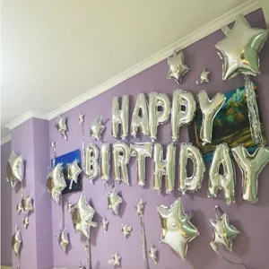 Birthday party decoration foil letter balloons and star foil balloons set for wall decoration.