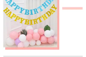 Detail view of glitter paper birthday banner, sparkling letters for party decoration.