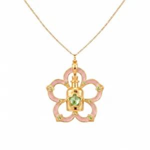 Collier flacon de potion féerique plaqué or avec zircon étoile verte et pétales émail rose.