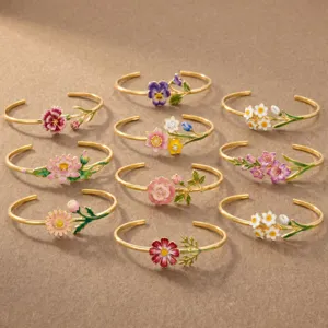 Detailed view of exquisite enamel flower open bracelets, featuring 18k gold plated stainless steel.
