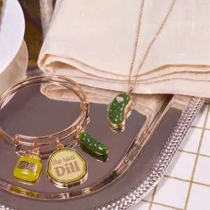 Quirky food pickle pendant necklace and charm bracelet set, gold tone enamel novelty jewelry gift.