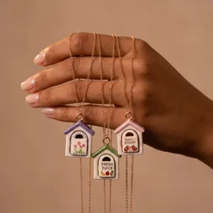 Miniature ceramic house pendant necklace detail, cute cartoon style jewelry gift accessory