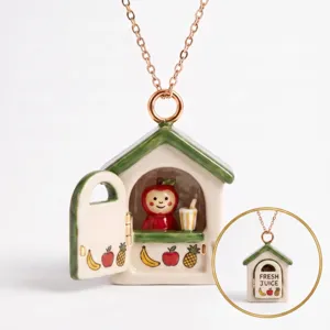 Detail view of the openable little house pendant necklace with cute juice bar interior.