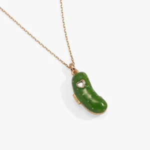 Gold-tone chain necklace featuring a green enameled pickle pendant with heart charm detail.