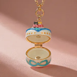 Exquisite openable cat pendant necklace with gold plated chain, elegant bow design, ideal gift.