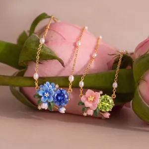 Exquisite gold-plated enamel flower necklace with colorful crystal and pearl details for women.